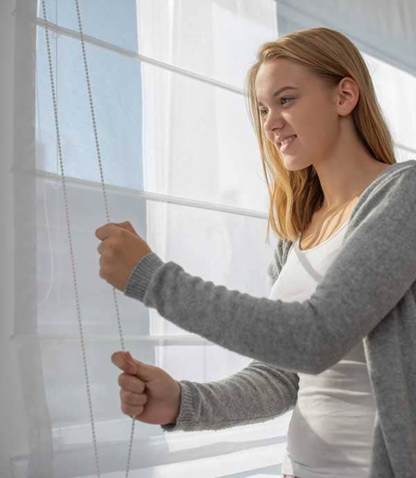Woman demonstrating easy up shades